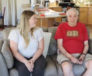 Elder Advocate Assistant Megan Brown and Brickstone Resident Jack Maniloff