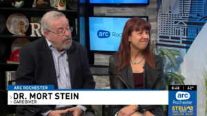 Dr. Mort Stein, St. John’s Meadows resident, and Jennifer Lesinski, St. John’s executive vice president of marketing.